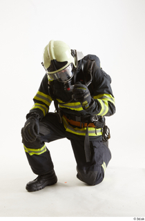 Sam Atkins Fireman Kneeling kneeling whole body 0001.jpg